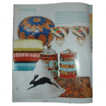 Blue and brown hassock pouf and Moroccan sconces