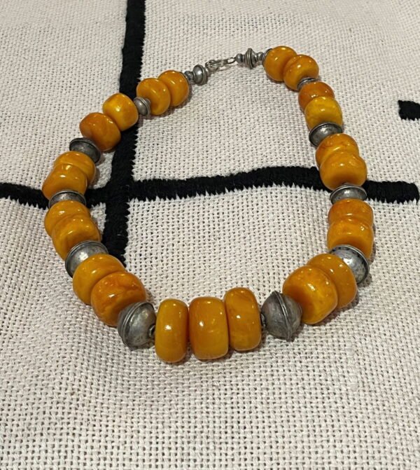 Berber necklace from Morocco with amber beads and antique silver balls