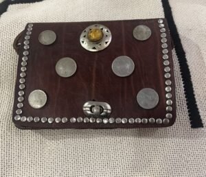 leather bag with old coins leather bag with old coins