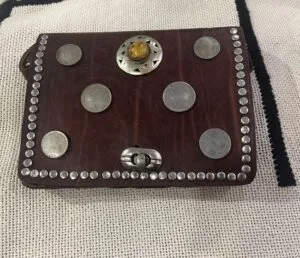 leather bag with old coins leather bag with old coins