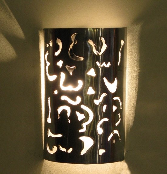 handcrafted Moroccan silver sconce is made of polished cast aluminum