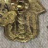 hanging hamsa in brass