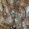 moroccan tea glasses feature gold designs,