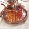 Moroccan teapot, tea glasses and tray