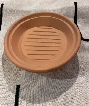 Morrocan unglazed base tagine plate Morrocan unglazed base tagine plate