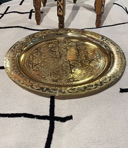 Moroccan brass table with folded wood legs