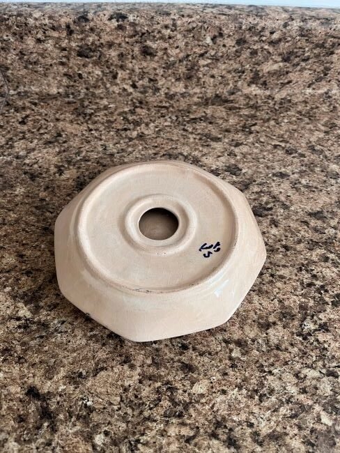 cigar ashtray, crafted with vibrant floral motifs that add a touch of color and personality to any space