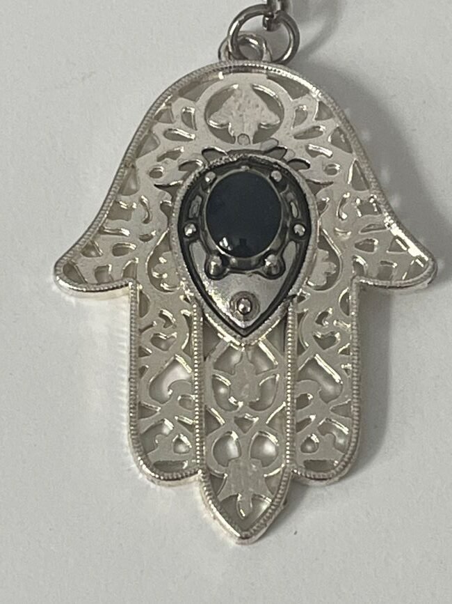 main contre mauvais œil