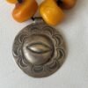 eye in medallion center pendant