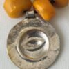 back of brass medallion of antique berber necklace