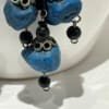 pierres en potterie bleu et argent compose materiel de ces boucles oreilles