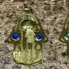 main-khamsa- protection-pierre-bleu brass hanging hamsa with bleu stones