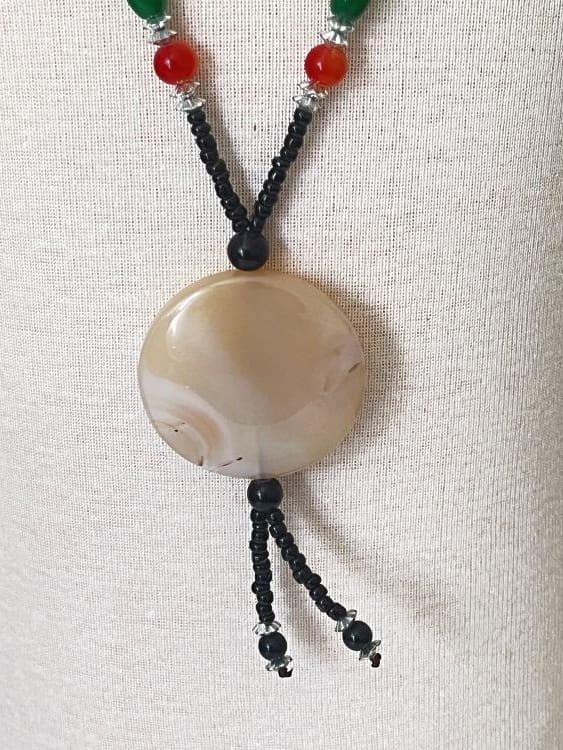 Pendentif rond poli en agate