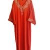 Orange caftan marocain orné de broderies dorées
