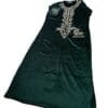 Moroccan kaftan combines the rich look of bleu velvet with elaborate gold-tone embroidery